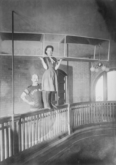 Woman in aeroplane ready for swimming, Pittsburgh, 1910. Creator: Bain News Service.