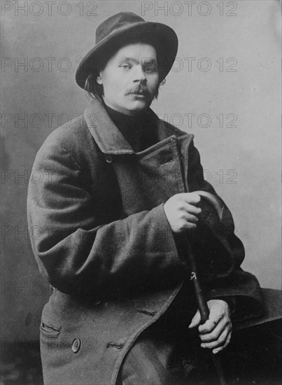 Maxim Gorky, seated with heavy coat on, 1910. Creator: Bain News Service.