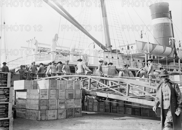 Loading U.S. Army transport ship Meade - League Isl'd., 1913. Creator: Bain News Service.