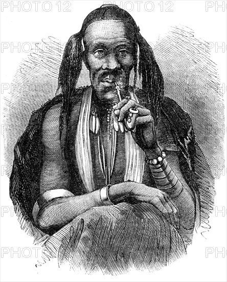 'A kaffir witch doctor, 1864'.  Creator: Unknown.