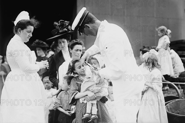 Hospital boat, a mother, her child, and a doctor, upper deck, 1910. Creator: Bain News Service.