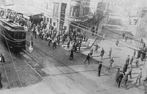 Rioters stoning a trolley car, Philadelphia, 1910. Creator: Bain News Service.