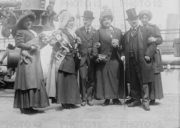 De Rigny and Tety Langy holding dogs, D'Alveres and brother, Oscar and Stella Hammerstein, 1910. Creator: Bain News Service.