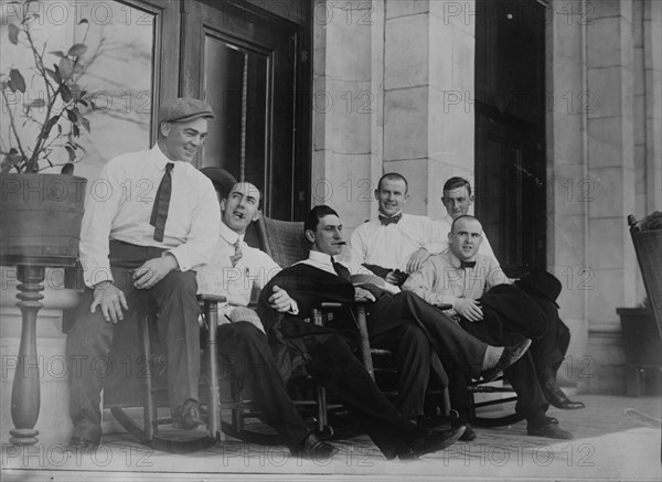Six Cleveland ball players seated on porch, 1910. Creator: Bain News Service.