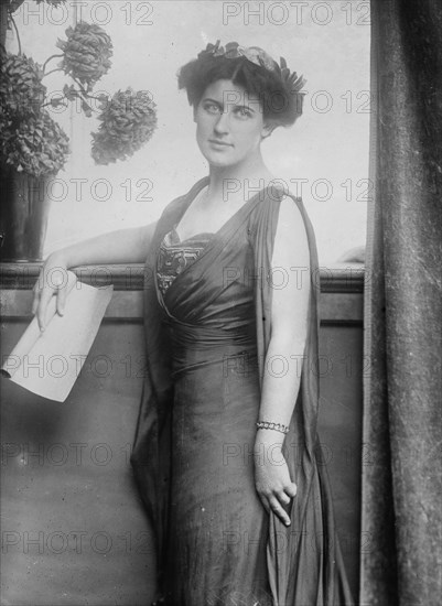 Mrs. Inez Milholland posing with scroll of paper, 1910. Creator: Bain News Service.