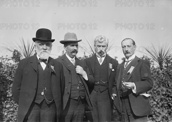 Jos. Ellis, Sir John Randles, G. Muir Ritchie, and Col. Sir Chas. Allen standing together... 1910. Creator: Bain News Service.