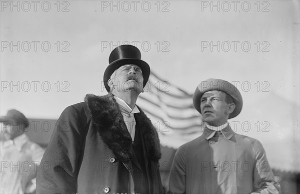 W. Wellman with unidentified gentleman at aviation meet, 1910. Creator: Bain News Service.