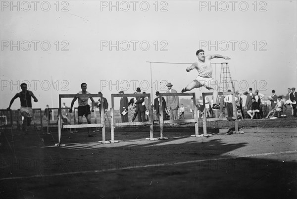 J.J. Eller wins 120 yd. Hurdle 1911, 1911. Creator: Bain News Service.