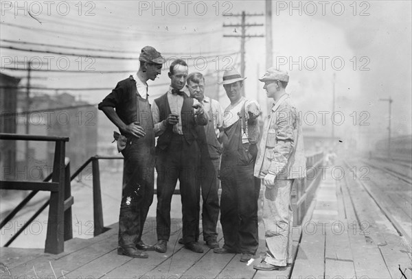 Penn. R.R. [i.e., Railroad] men talk strike, 1910. Creator: Bain News Service.