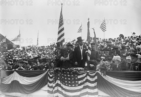 J.S. Sherman, Gov. Fort and Com'r van Sant review G.A.R. Parade- Atlantic City, 1910. Creator: Bain News Service.