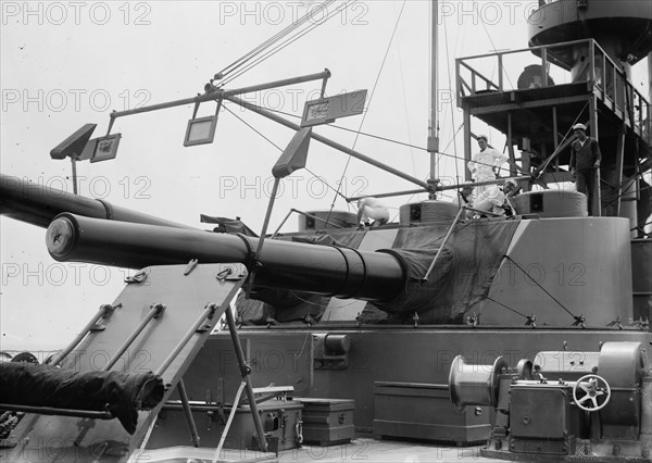 War game-10 in. gun practice - USS Seattle, between c1910 and c1915. Creator: Bain News Service.