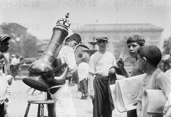 Selling cool drinks in Syrian Quarter, between c1910 and c1915. Creator: Bain News Service.