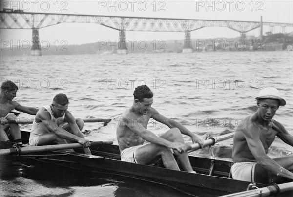 Stanford University crew rowing on Hudson River with Poughkeepsie Bridge..., between c1910-c1915. Creator: Bain News Service.