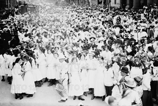 Hoisting flag - Wash. High School, between c1910 and c1915. Creator: Bain News Service.