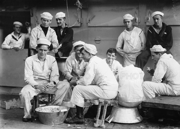 Peeling potatoes on USS Arkansas, between c1910 and c1915. Creator: Bain News Service.