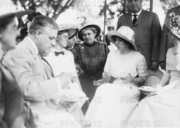 Eleanor Wilson, daughter of Woodrow Wilson, with her sister Jessie and others, c1914. Creator: Bain News Service.