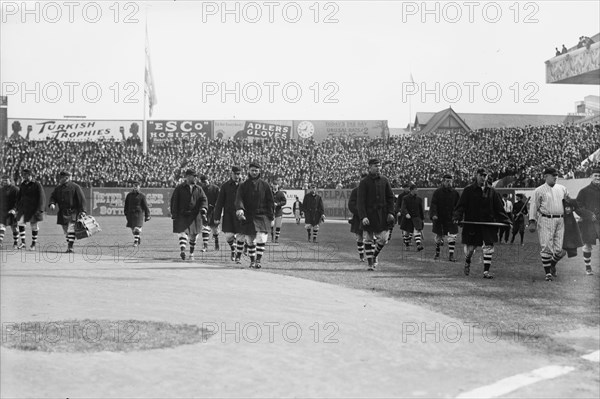 New York Giants walk onto the field at the Polo Grounds New York prior to Game One of the 1912.... Creator: Bain News Service.