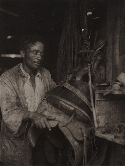 Man With A Saddle, c1920s. Creator: Doris Ulmann.