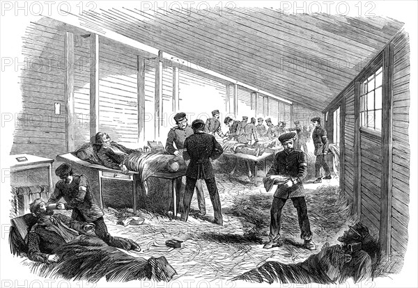 The War in Denmark: temporary field hospital...scene in the amputating hut..., 1864. Creator: Unknown.