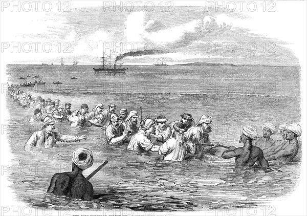 The Indo-European Telegraph: Landing The Cable in the mud at Fao, Persian Gulf, 1865. Creator: Unknown.