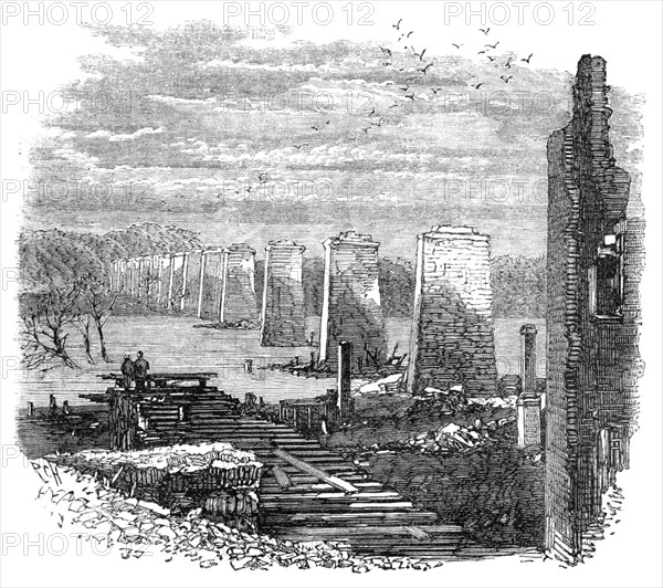 Richmond, Virginia: ruins of the railway bridge, 1865. Creator: Unknown.