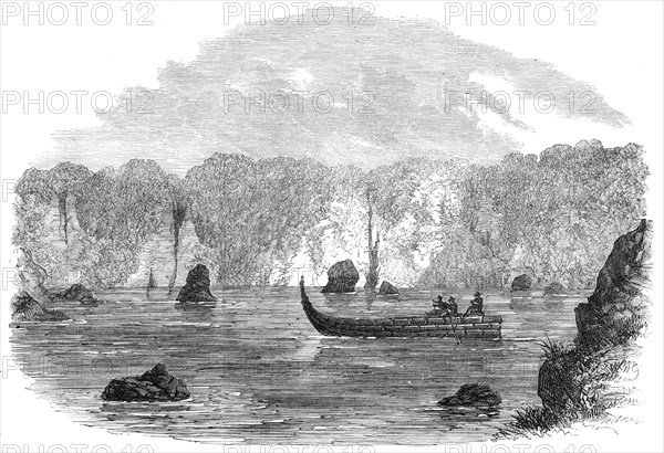 An Exploring Party on the West Coast of New Zealand: floating down the River Teramakau, 1865. Creator: Unknown.