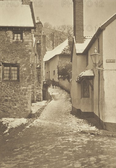 [Snow on roofs, alleyway]. From the album: Photograph album - England, 1920s. Creator: Harry Moult.