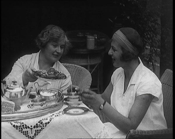Betty May Nuthall Shoemaker, the British World Top Female Tennis Player, Drinking Tea..., 1920. Creator: British Pathe Ltd.