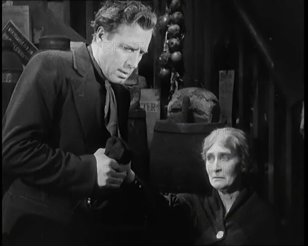 Scene from the Film 'The Informer': Lars Hansen Arriving at the House of the Mother..., 1920s. Creator: British Pathe Ltd.