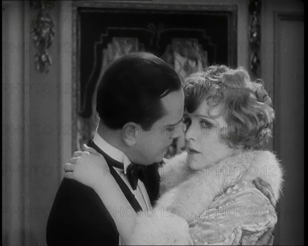 Scene from the Film 'Champagne': The Actress Betty Balfour Embracing the Male Actor Jean..., 1920s. Creator: British Pathe Ltd.
