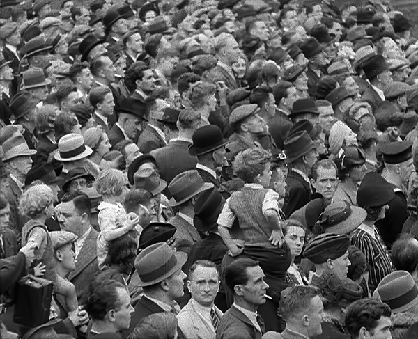 A Crowd watching a Military Band in Trafalgar Square, 1940. Creator: British Pathe Ltd.