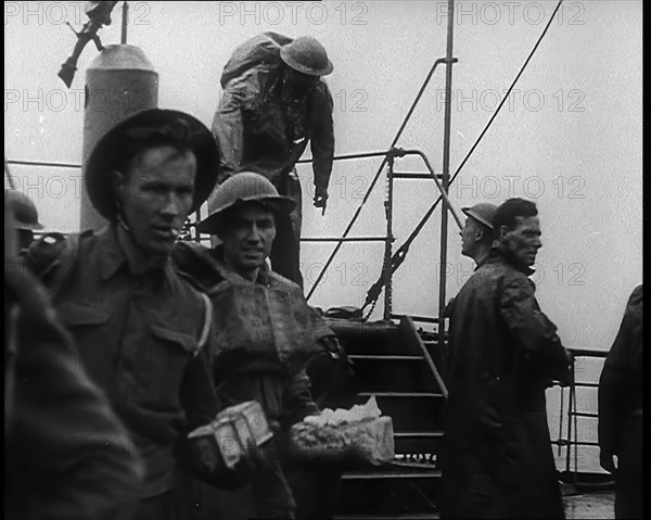 British Soldiers Climbing Aboard Ships at Dunkirk for the Evacuation, 1940. Creator: British Pathe Ltd.