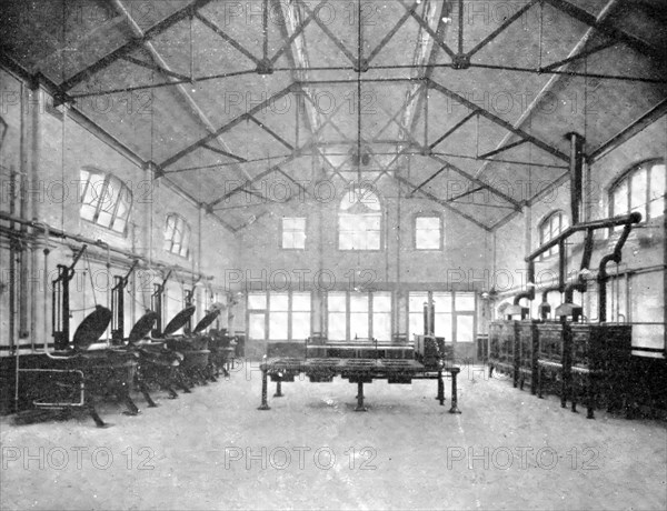 Feeding the Invalid, The Nurse, And The Doctor: Kitchen, Royal Infirmary, Manchester, 1909. Creator: Unknown.