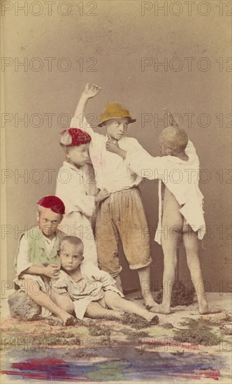 Five Italian street boys: two seated, three standing, 1865-1875. Creator: Arena & D'Alessandri.