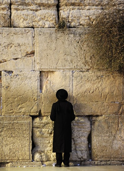 A Jew praying at the Western Wall, Jerusalem, Israel, 2013. Creator: LTL.