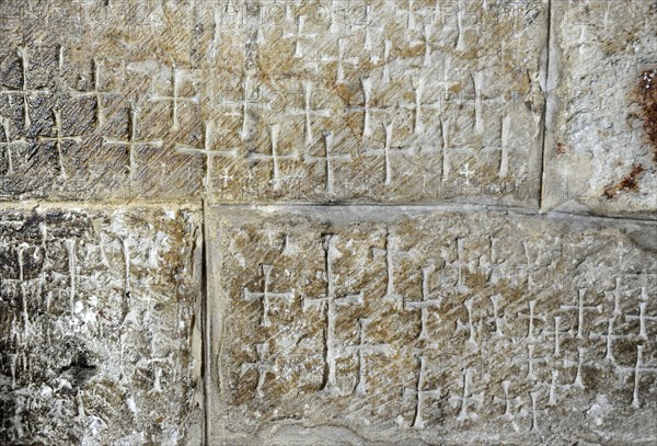 Crusader graffiti on the walls of the stairs leading to the Chapel of Saint Helena. Creator: Unknown.