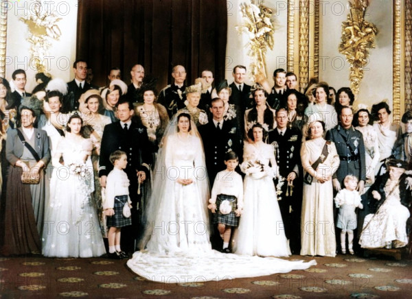 Queen Elizabeth II (b1926), Prince Philip (b1921) and other members of the Royal Family, 1947. Wedding photograph. (Colorised black and white print).