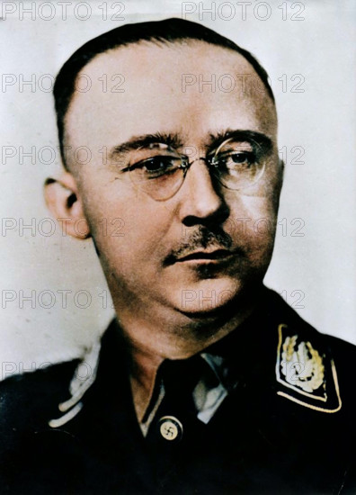 Heinrich Himmler, Reichsführer of the SS, c1930s-c1940s. Himmler (1900-1945) took part in Adolf Hitler's Beer Hall Putsch in Munich in 1923. He joined the SS in 1925, becoming its leader, or Reichsführer, in 1929. He went on to become one of the most powerful figures in the Nazi Party and was responsible for overseeing the organisation and administration of the Holocaust. In late April 1945 as the Second World War neared its end in Europe, Himmler went behind Hitler's back in an attempt to open negotiations with the Western Allies. When Hitler disovered this he stripped Himmler of all his offices and ordered his arrest. He tried to evade capture by disguising himself after the War ended, but was captured by the British on 22 May 1945. The following day, before he could be interrogated, Himmler committed suicide by biting a potassium cyanide capsule. (Colorised black and white print).