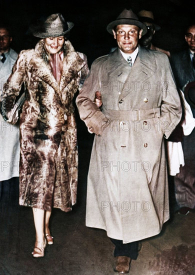 Hermann Göring, Nazi politician and military leader, with his wife Emmy, c1935-c1945. A German actress, Emmy Sonnemann (1893-1973) became the second wife of Luftwaffe Commander-in-Chief Hermann Göring in 1935. She served as Adolf Hitler's hostess at many state functions, which led to her claiming the title of "First Lady of the Third Reich". (Colorised black and white print).