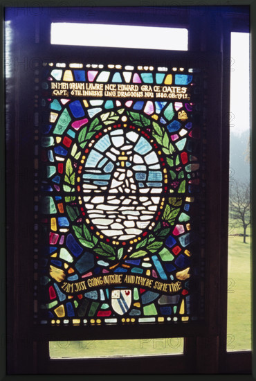 A stained glass window commemorating Lawrence Edward Grace Oates in The Oates Memorial Museum at The Wakes, High Street, Selborne, Hampshire, 1973. The window commemorates explorer Lawrence Oates, who died in Antarctica in 1912. The inscription at the base is of Oates' final words: "I'm just going outside and may be some time".