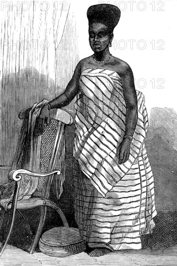 The War on the Gold Coast: a belle of Cape Coast Castle, 1873. Young woman from West Africa. Engraving 'copied from photographs lent us by Mr. James Irvine, F.R.G.S., of Birkenhead. He got them in 1869, at Cape Coast Castle, from the photographer there, who is a native of Sierre Leone'. From "Illustrated London News", 1873.