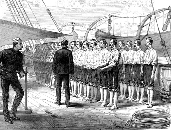 Life on board a troop-ship: inspection of hands and feet, 1873. 'Major W. O. Carlile's sketches of life on board a troopship, though not actually taken, upon this occasion, from the transports now engaged in carrying our soldiers to West Africa, have yet a special interest at the present time. The regulations and habits of daily experience in such voyages were detailed in our former notices. For the prevention of irregularities and excess in drink, and for the preservation of health, the men are subjected to very stringent rules; and it is the duty of their officers to see these rules enforced...The men have to show their bare hands and feet to the medical officer daily, to see that there is no skin disease or scurvy'. From "Illustrated London News", 1873.