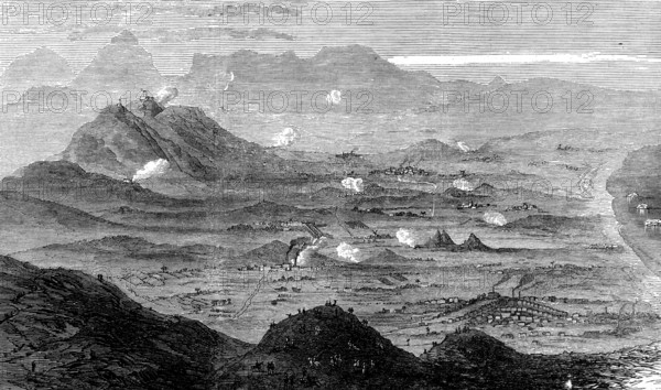 Bombardment of Carthagena: view from Mount Forman, looking west, 1873. 'The naval seaport..., on the Mediterranean coast of Spain, is still held by the faction of Intransigentes, or fanatical Communists, against the Government of Madrid...The bombardment, though ineffective for the reduction of a fortified place, has caused a terrible amount of distress to the people of the town...We are indebted to Dr. Fleetwood Buckle, senior surgeon of H.M.S. Invincible, for a sketch taken by him on the 28th from the top of Mount Porman, a height of 1000 ft., looking westward, which gives a view of the valley behind Carthagena, with the forts and batteries, and the lines of besiegers and besieged...In the middle...is a richly-cultivated, fertile plain, interspersed with villages, gardens, orange groves, country houses, and factories...Halfway across the plain is the busy little manufacturing town of Las Alumbras; to the right...are the English iron and lead works of Las Herrerias...In the left centr...