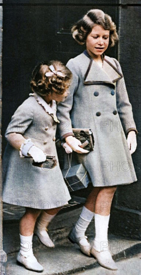 Princess Elizabeth and her sister, c1936. The future Queen Elizabeth II (right), with Princess Margaret Rose. Illustration from "George V and Edward VIII, A Royal Souvenir", by FGH Salusbury, a souvenir book published as Edward VIII was crowned following the death of his father, George V, (Daily Express Publication, London, 1936). (Colorised black and white print).