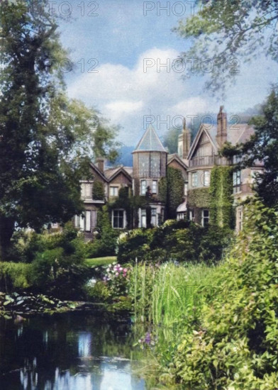 'The King's Birthplace', c1937. York cottage on the Sandringham estate. The birth place of King George VI. From "Our King & Queen and the Royal Princesses". [Odhams Press Ltd., London, 1937]. (Colorised black and white print).