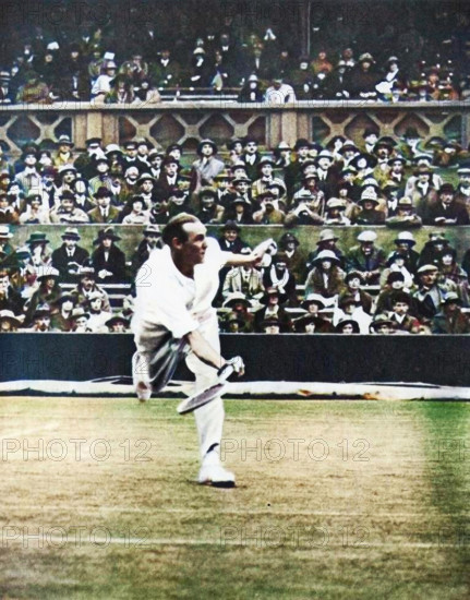 Tennis match on Centre Court at Wimbledon, c1930s, (1935). The All England Lawn Tennis and Croquet Club moved to its present site in Church Road, Wimbledon, south London, in 1922. From "The Silver Jubilee Book - The Story of 25 Eventful Years in Pictures". [Odhams Press Ltd., London, 1935] (Colorised black and white print).