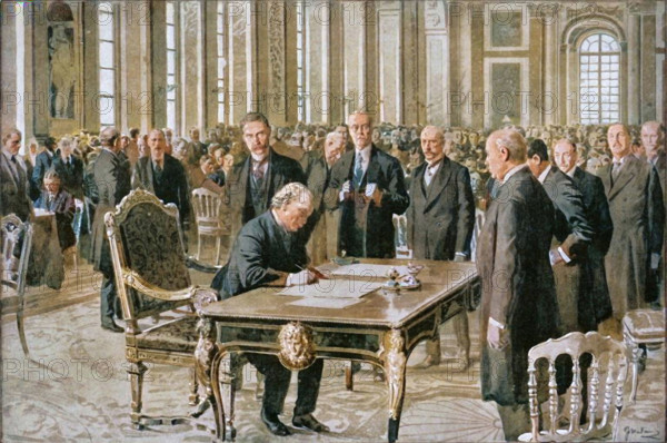 'The Prime Minister of Great Britain Signing the Peace Treaty', 1919. British Prime Minister David Lloyd George signed the Treaty of Versailles, bringing World War I to an end, at Versailles in France on 28 June 1919. From "The History of the Great European War: its causes and effects", Vol. X, by W. Stanley Macbean Knight. [Caxton Pulishing Company, Limited, London, 1919]. (Colorised black and white print).