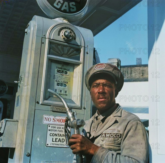 [Untitled photo, possibly related to: Washington, D.C. Negro mechanic for the Amoco oil company]. (Colorised black and white print).