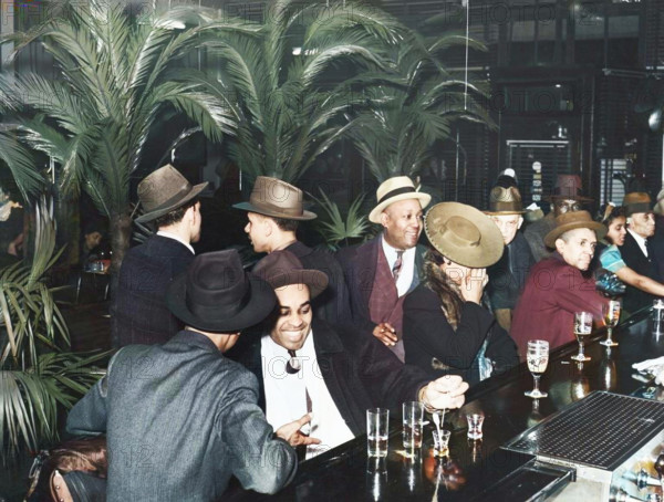 The bar at Palm Tavern, Negro restaurant on 47th Street, Chicago, Illinois, April 1941. (Colorised black and white print).