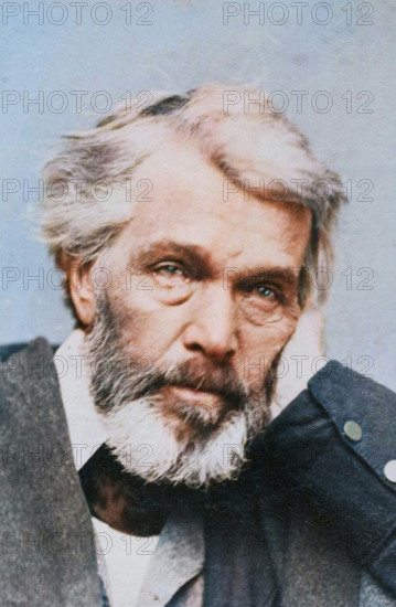 Portrait of Thomas Carlyle, about 1860-1881. Additional Info: Bust portrait of an older man with his head held in his left hand. (Colorised black and white print).